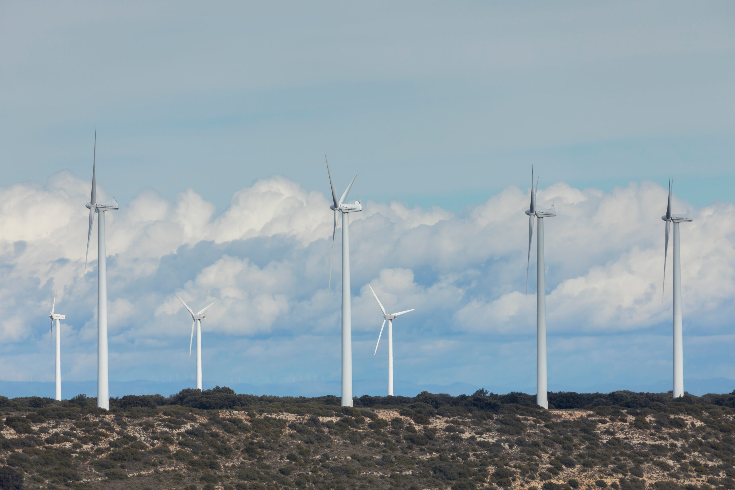 Old wind turbines on the hills of Caragueyes and Paterra, against a background of clouds on a February day, near Borja, Zaragoza province.